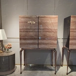 Warm Beige Stone-Pattern Double-Door Wine Cabinet with Dark Wood Interior, Built-In Drawers and Sculptural Metal Legs